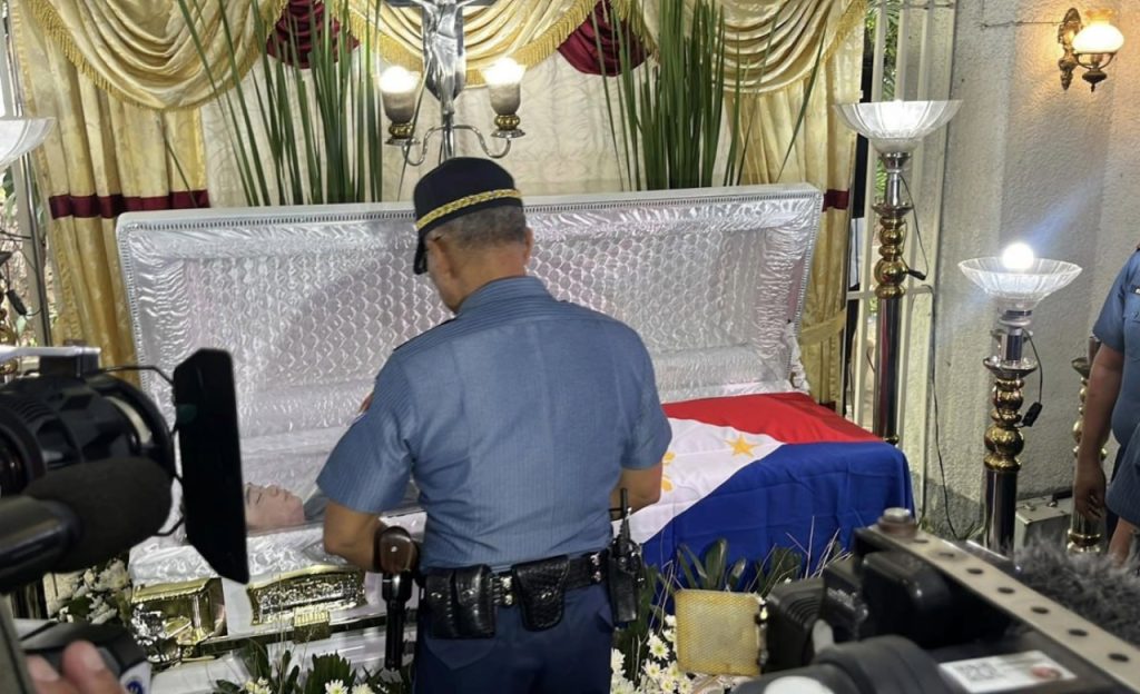 PNP chief Torre visits wake of cop killed in QC shootout 1