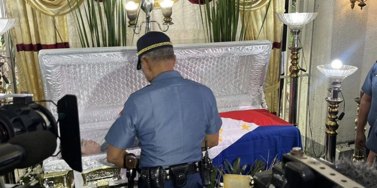 PNP chief Torre visits wake of cop killed in QC shootout 1